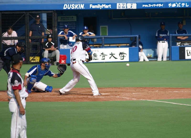 Ohmatsu swings at the game-winning pitch