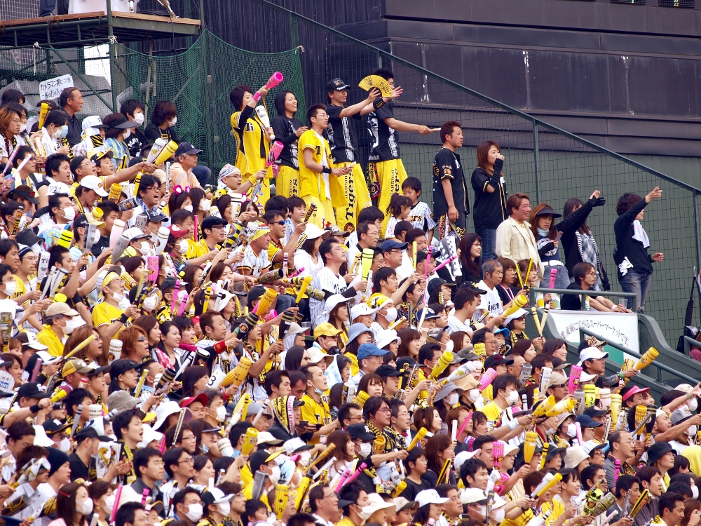 Hanshin fans try to rally their team on 