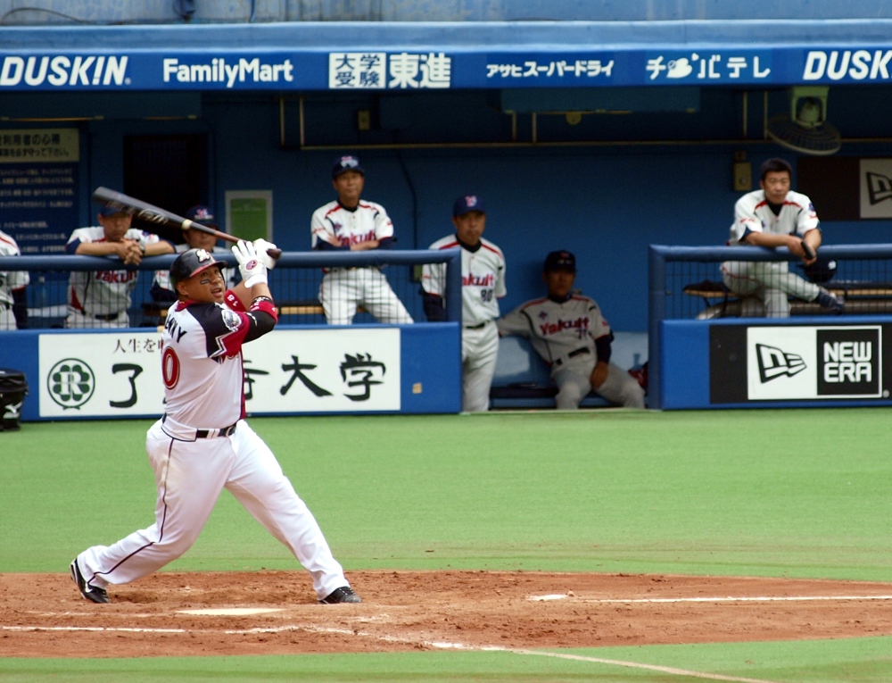 Benny watches the ball sail off his bat