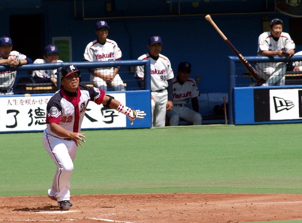 Sato throws his bat but has to get it back; it's foul