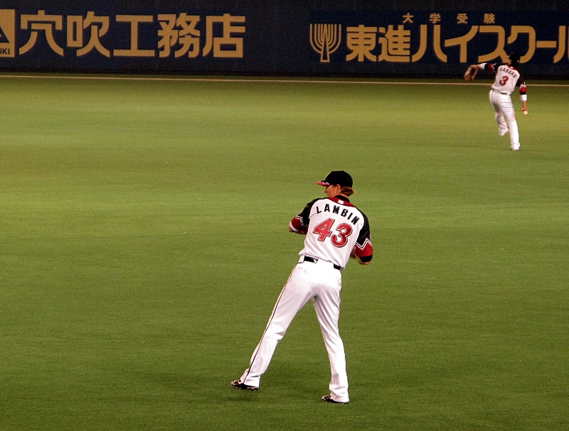 Lambin and Saburo prepare to watch balls fly over their heads