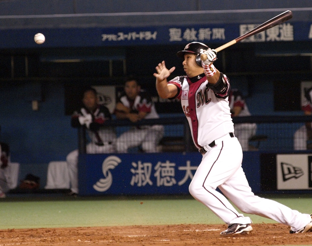 Possibly the only pic I have of Sato with a bat still in his hands