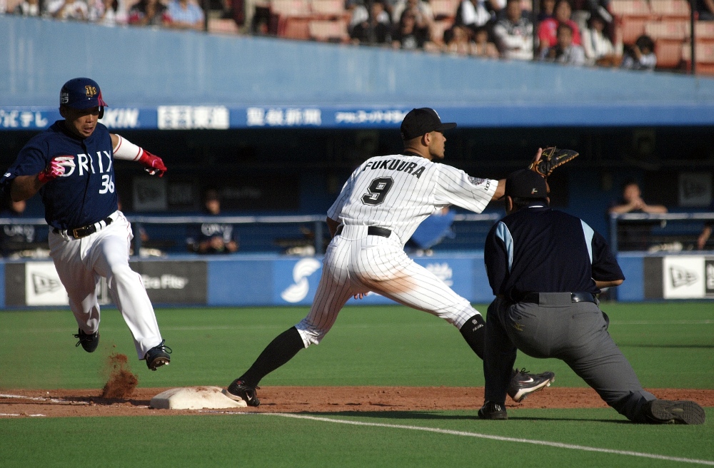 Close play at first, but believe me, Fukuura's got that ball first