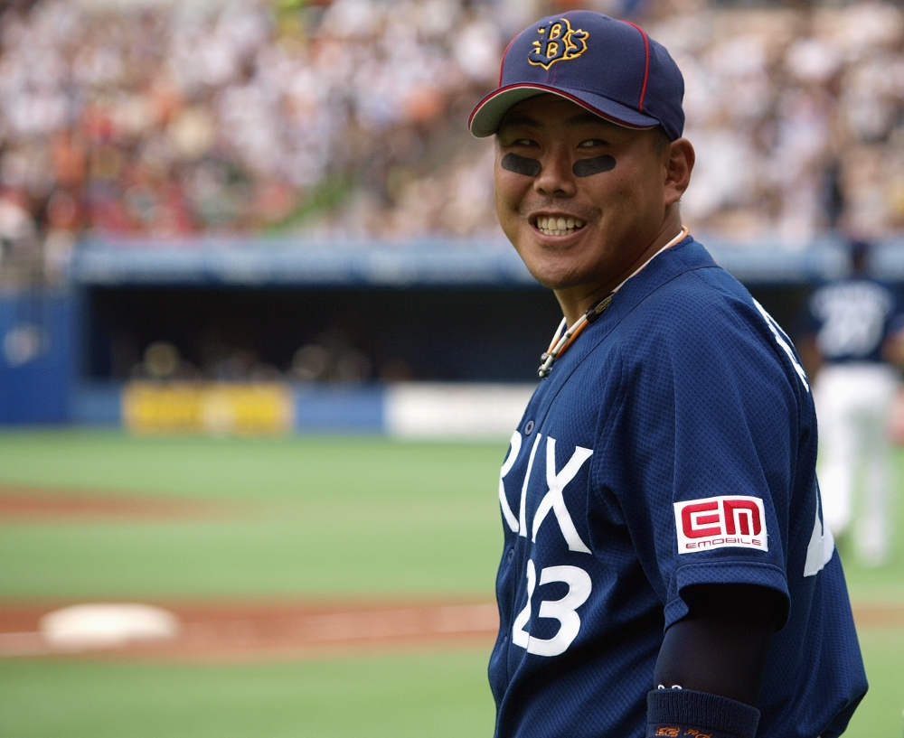 Kitagawa gives a bit of an 'oh well!' smile after Tsuyoshi's heady play